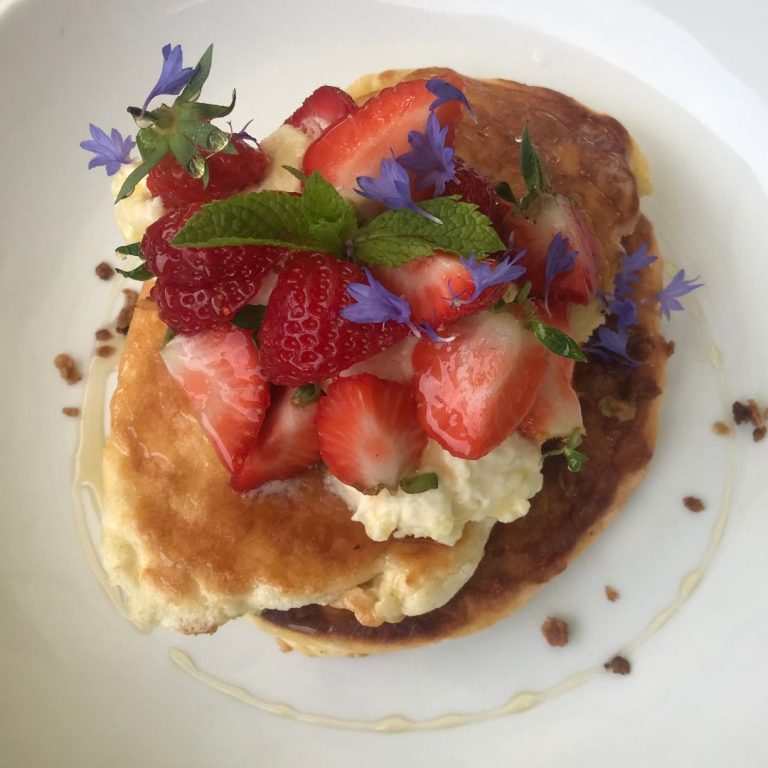 pancakes with strawberries and coconut cream
