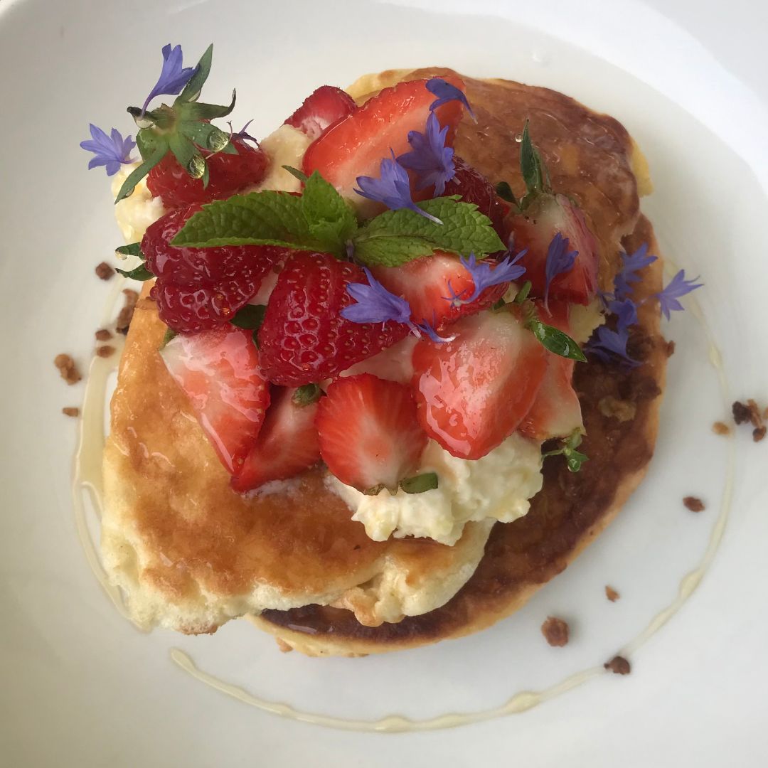 pancakes with strawberries and coconut cream